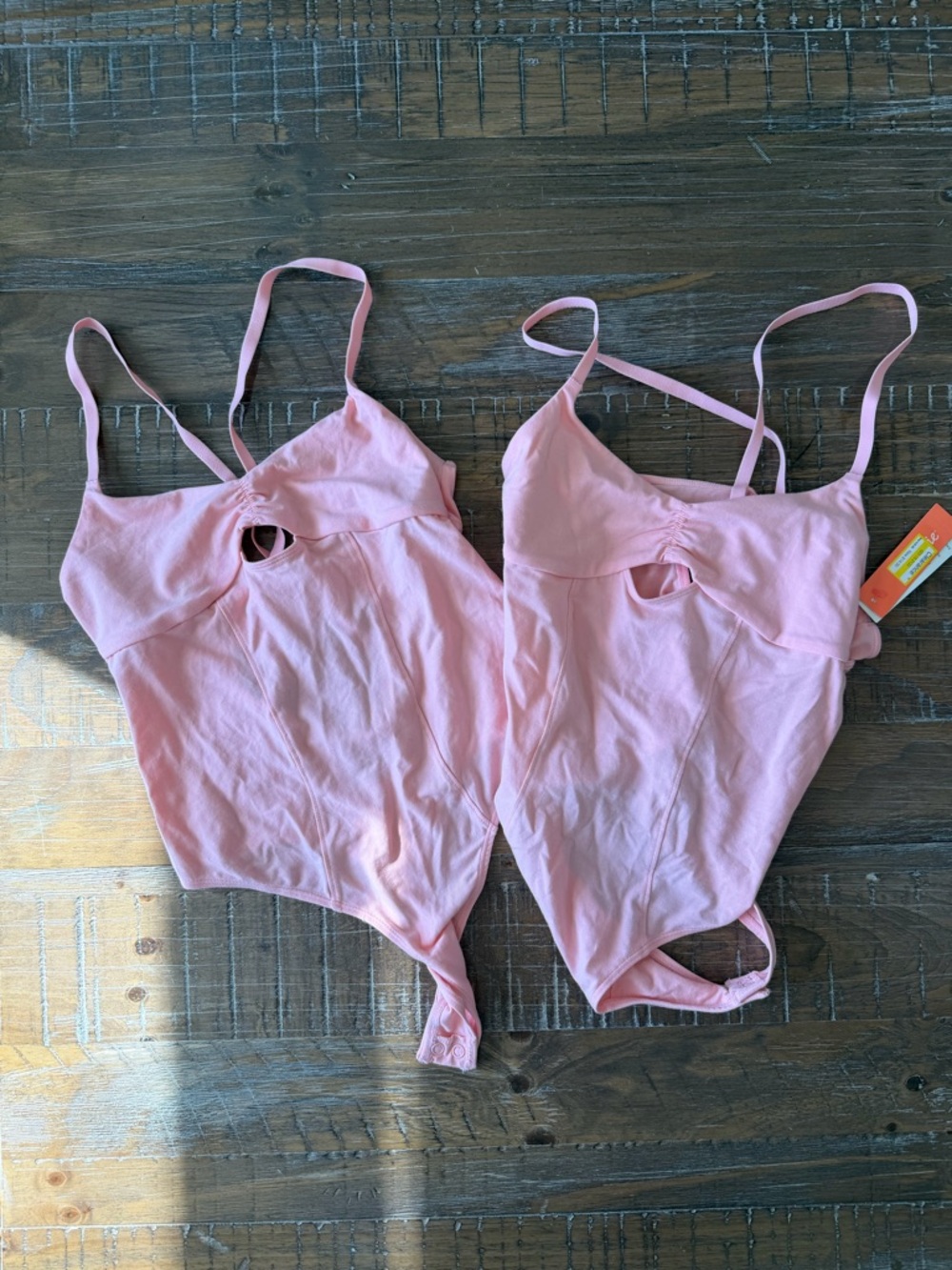 Pink One-Piece Bodysuit with Keyhole Detail x 2 size XS and S NWT NWOT Festival